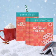 Patchology Holiday Treats limited edition cooling hydrating eye patches displayed in festive winter snow scene