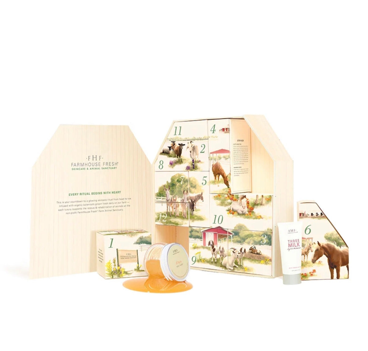 FarmHouse Fresh advent calendar set with barn-shaped box featuring numbered farm animal illustrated doors
