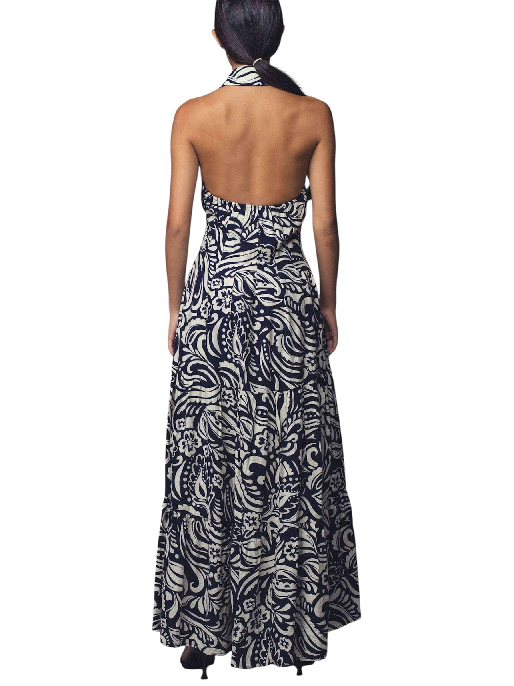 urban halter dress BDG Iris Smocked Plunging V-Neckline Halter Mini Dress