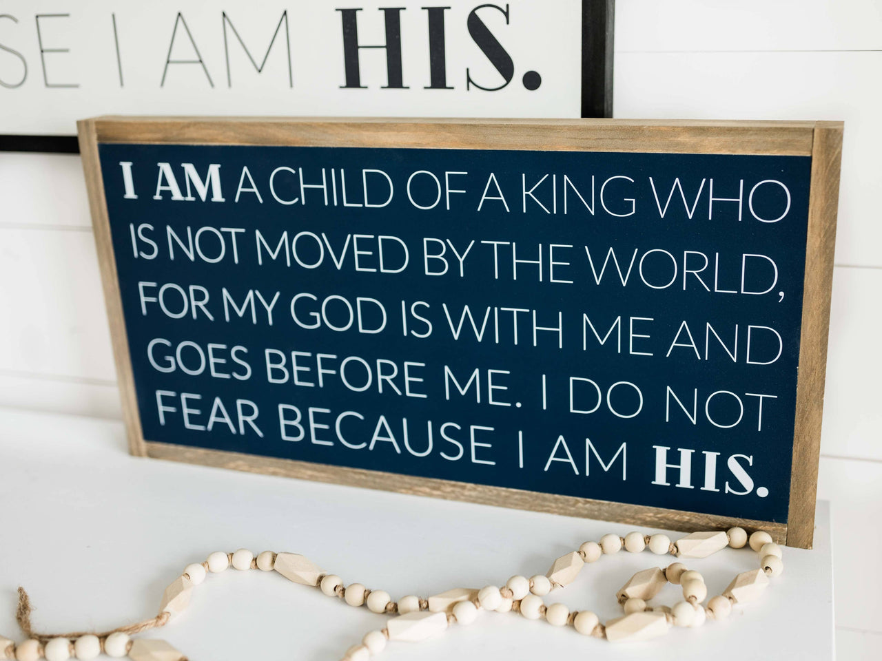 I Am His | Wall Art: Black-White Text / Light Brown Frame / 24 inches x 12 inches Joyfully Said