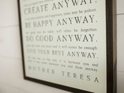 Love them Anyway | Mother Teresa | Wall Art: Soft White-Black Text / Dark Brown Frame / 8 inches x 12 inches Joyfully Said
