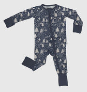 Long-sleeve zip pajamas in navy with an adventure-themed pattern, featuring convertible feet and mitts.